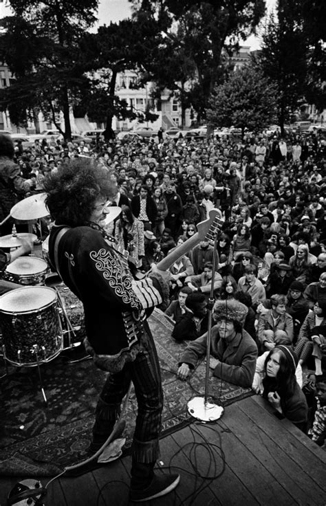 Jimi Hendrix performing onstage at a free concert in the Panhandle ...