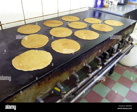 Interior of a traditional Stoke / Staffordshire Oatcake shop, with bright yellow frontage ...