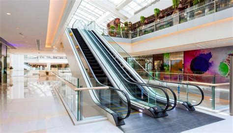 Escalator in modern shopping mall - Building