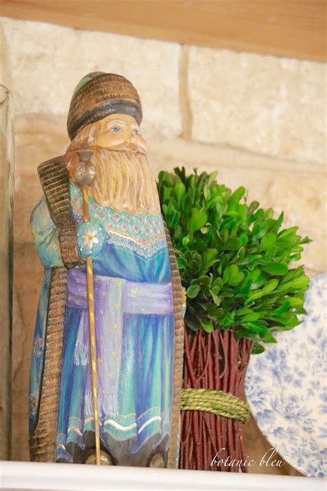 Hand carved wood Russian blue Santa in French country Christmas kitchen ...