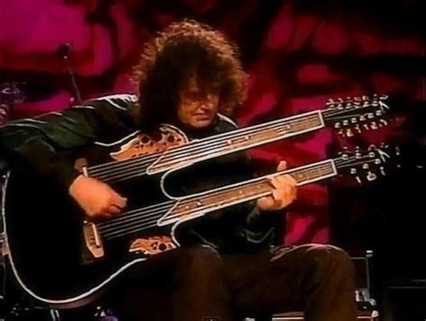 Jimmy Page and his Ovation double neck acoustic guitar during the Page and Plant tour in the 90s ...