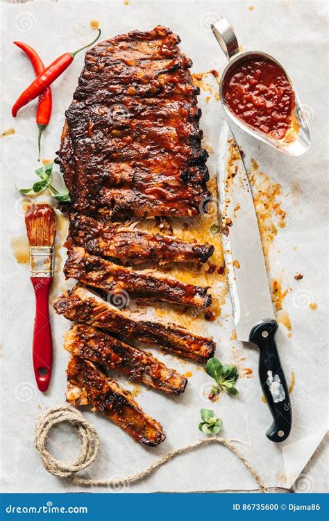 Beef ribs with bbq sauce stock photo. Image of board - 86735600