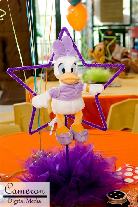 Mickey mouse female duck centerpiece design. | Birthday party decorations, Birthday parties ...