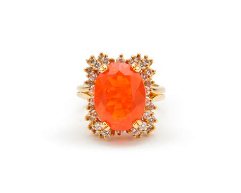 Lot - 18K Gold, Mexican Fire Opal, and Diamond Ring