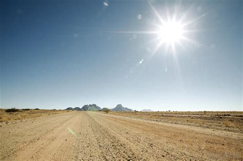 Image: African dirt road under hot sun | Stock photo by JF Maion