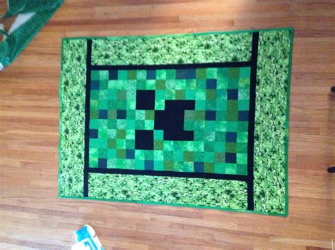 Here's the quilt I made my son. Minecraft creeper quilt. Now he wants the sheeper. Minecraft ...