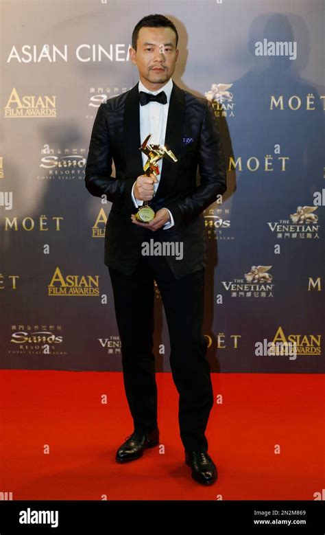 Chinese actor Liao Fan poses after winning the Best Actor award for his ...