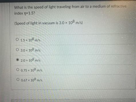 Solved What is the speed of light traveling from air to a | Chegg.com