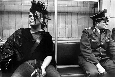 Punk and a member of the Volkspolizei sitting together in the Ubahn. East-Berlin, 1983 | East ...