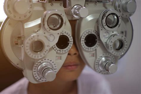 Child eye exam, kid eye test, Phoropter eye test 42334446 Stock Photo ...