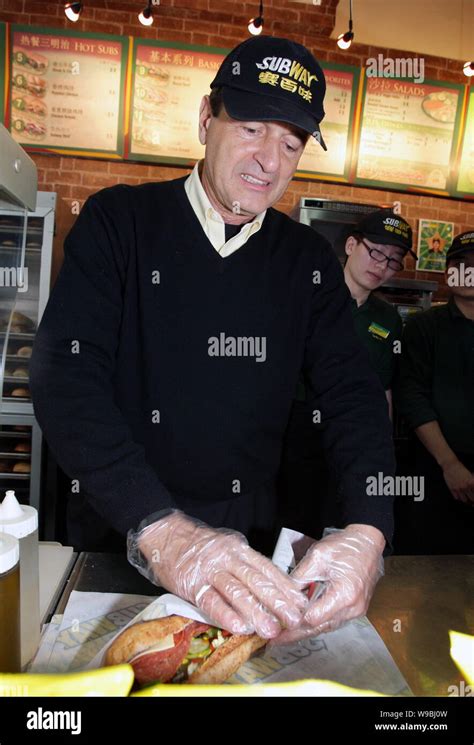 Fred DeLuca, President of Subway, packs a sandwich at a Subway ...