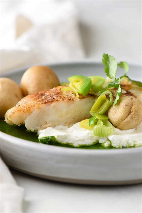 Chilean Sea Bass with Potatoes & Herb Sauce - Foxes Love Lemons