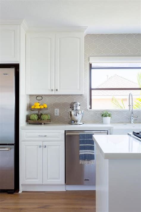 Taupe Backsplash Tiles in White Kitchen - Transitional - Kitchen