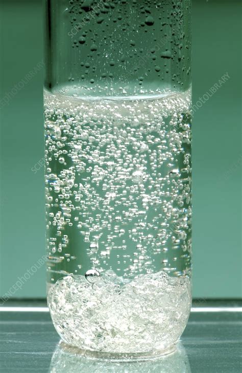 Reaction of sodium carbonate in acid - Stock Image - A500/0758 - Science Photo Library