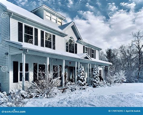 A New England White Colonial in Winter Stock Image - Image of cloudy, blue: 170974395