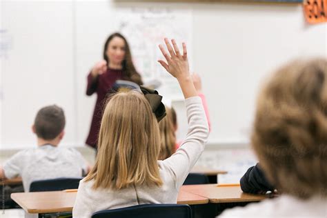 "Classroom: Girl Student Raises Hand In Class" by Stocksy Contributor ...