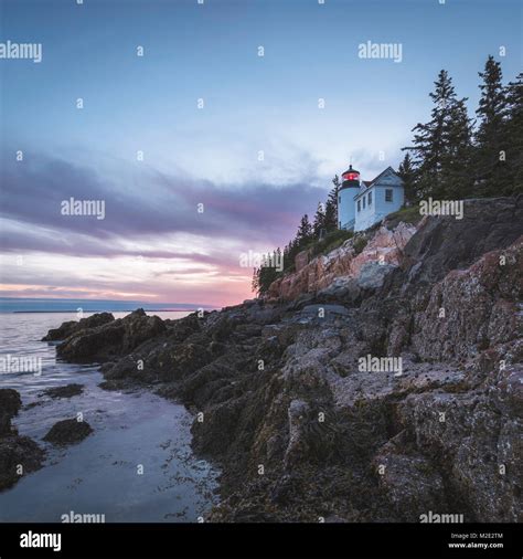 House on cliff near ocean at sunset Stock Photo - Alamy