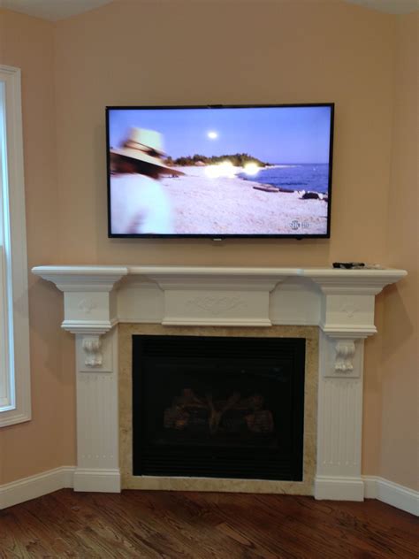 TV over fireplace hidden cable box. | Freestanding fireplace, Fireplace built ins, Fireplace