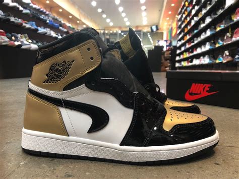 Viral Air Jordan 1 'Gold Toe' with Upside Down Swoosh Now Up for Auction - WearTesters