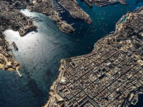 A bird's - eye view of Malta's baroque capital city Valletta and it's suburb Floriana flanked ...