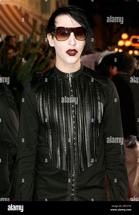 Musician Marylin Manson poses for photographers at the film premiere of "Pirates of the ...