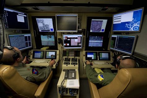 Drone pilots: A 9th Attack Squadron MQ-9 Reaper pilot, left, and 49th ...