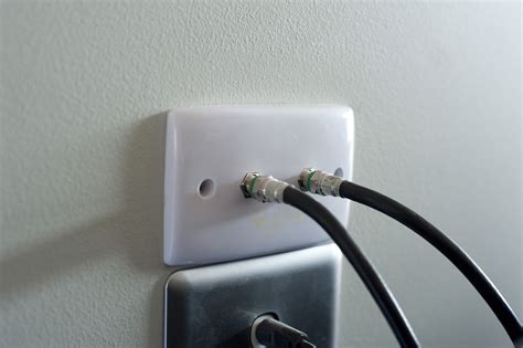 Free Image of Wall socket with TV cables | Freebie.Photography