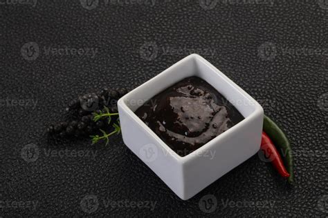 Black pepper sauce for meat 7860523 Stock Photo at Vecteezy