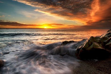 Whiterock at sunrise | Sunrise, Sunset, Natural landmarks