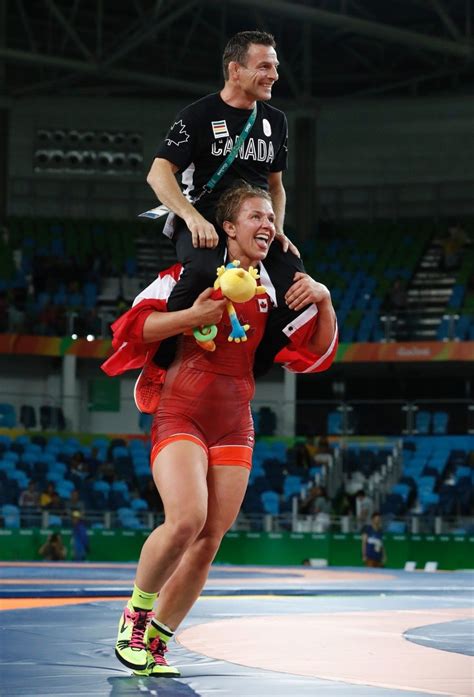 Here Is Adorable Badass Erica Wiebe Carrying Her Coach After She Won Gold | Muscle women, Female ...