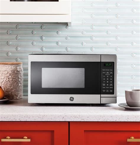 GE - 0.7 Cu. Ft. Compact Microwave - Stainless steel | Compact ...