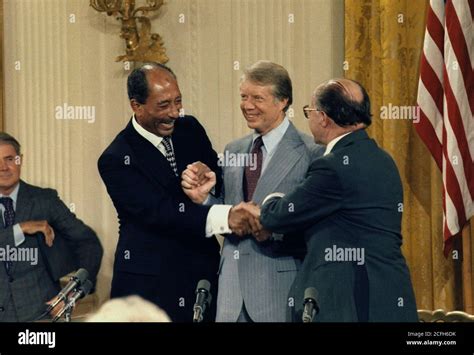 "Anwar Sadat, Jimmy Carter and Menahem Begin at the Camp David Accords ...