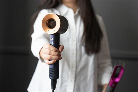 Dyson Hair Dryer vs Airwrap Styler - Which Is Better? - Your Best Digs