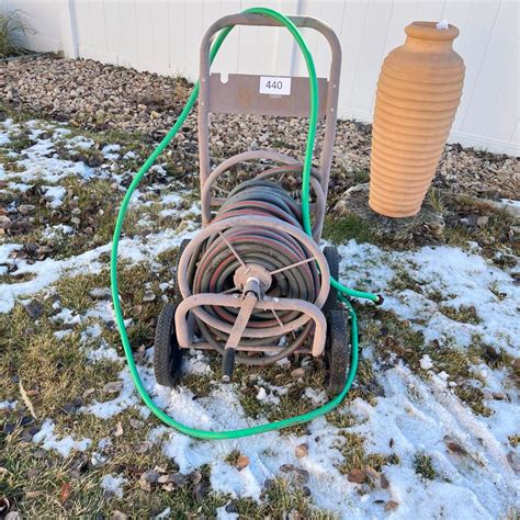 Hose Caddy w/ Hose | EstateSales.org