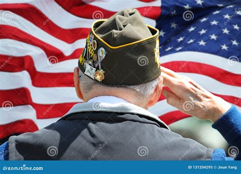 Veteran Saluting in Front of US Flag Editorial Image - Image of salute ...