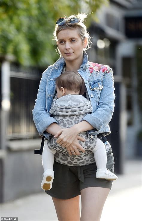 Rachel Riley enjoys family shopping trip with baby daughter Maven and husband Pasha Kovalev ...