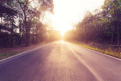 empty asphalt road and sunset 19885855 Stock Photo at Vecteezy