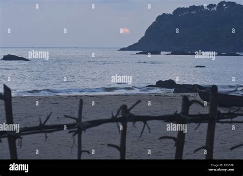 Sunset at Karwar beach with a fishing boat-North Kanara-Karnataka-India - No-3 Stock Photo - Alamy