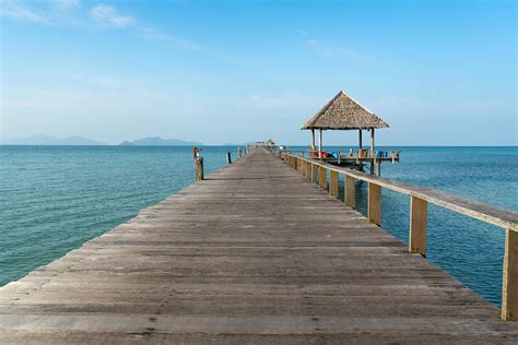 Wooden Pier Between Sunset In Phuket Photograph by Prasit Rodphan ...