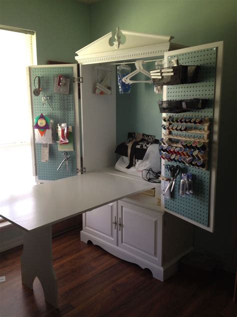 TV Armoire turned into a sewing cabinet with fold up table | Craft room design, Sewing rooms ...