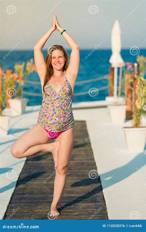 Pregnant Woman Practicing Yoga at the Beach Stock Photo - Image of exercise, nature: 112028376