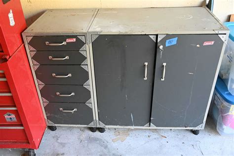 Lot # 80 COLEMAN garage cabinets (2 pieces) with 1 key - Paradise Estate Sales