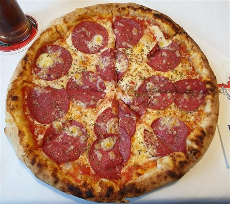 Salami Pizza from my local croatian restaurant. Delicious. : r/Pizza