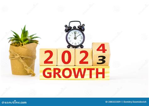 Planning 2024 Growth New Year Symbol. Businessman Turns a Wooden Cube ...