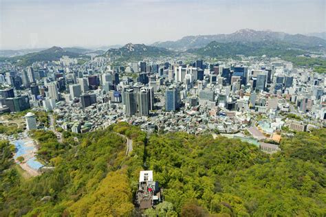 South Korea, Seoul. City view from Seoul Tower with Namsan Park and Namsan Cable Car stock photo