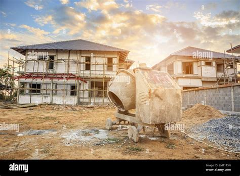 cement concrete mixer machine at new house building construction site ...