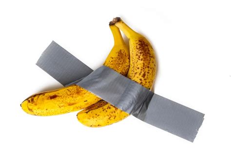 Premium Photo | Banana duct taped to the wall Conceptual photo