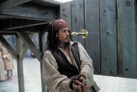 Johnny Depp as Captain Jack Sparrow - Pirates of the Caribbean: The ...