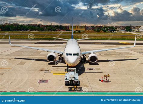 TUG Pushback Tractor with Aircraft Stock Photo - Image of airline ...