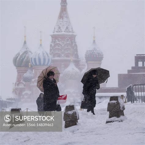 Heavy snowfall in Moscow. Red Square, Moscow, Russia. - SuperStock